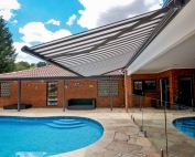 Brustor-B50-Full-Cassette-Folding-Arm-Awnings-1 over the pool