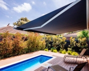 Brustor-B50-Full-Cassette-Folding-Arm-Awnings-10 near the pool