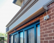 Brustor-B50-Full-Cassette-Folding-Arm-Awnings-13 outside a house