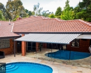 Brustor-B50-Full-Cassette-Folding-Arm-Awnings-2 over a pool