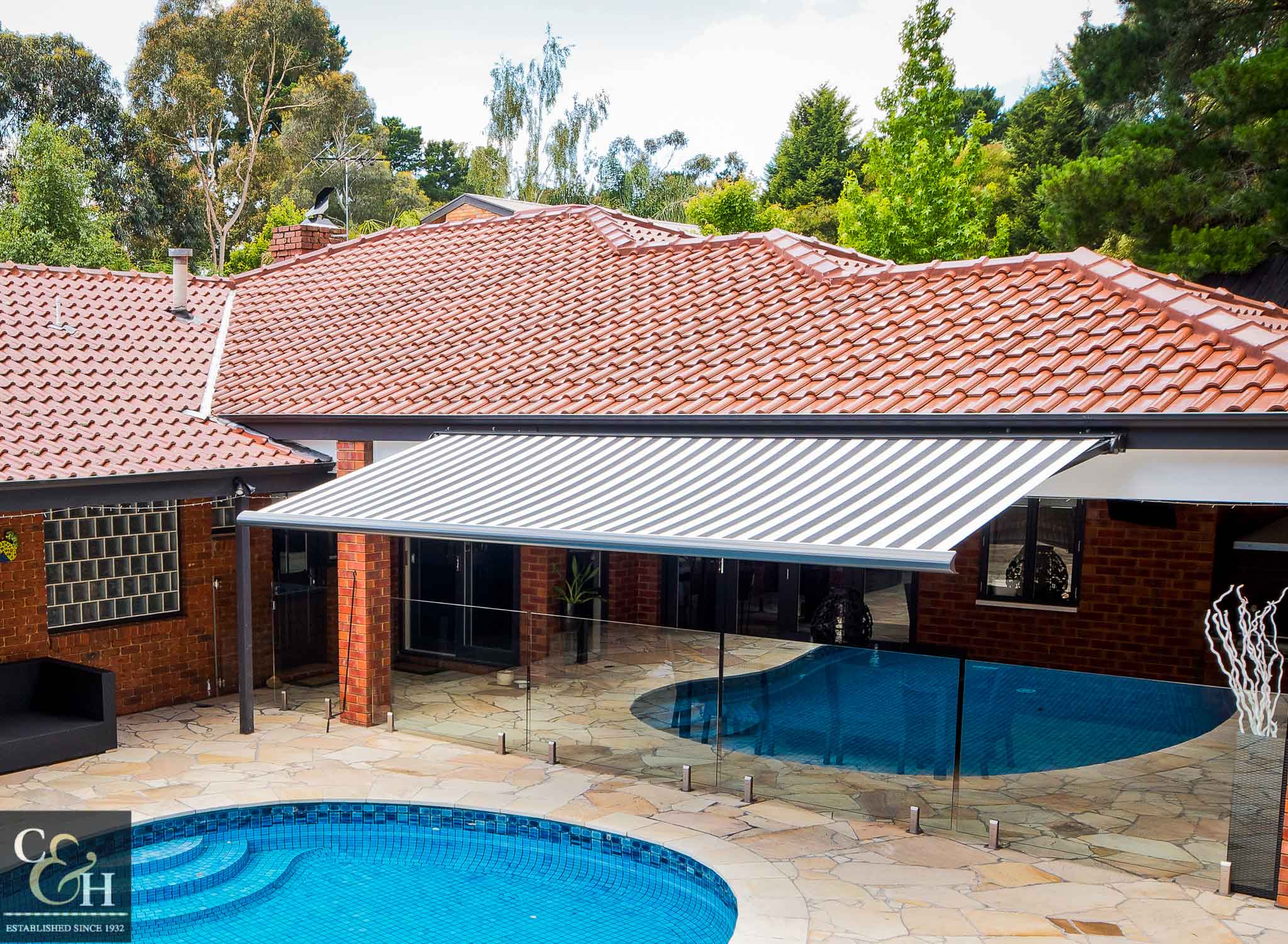 Brustor-B50-Full-Cassette-Folding-Arm-Awnings-2 over a pool