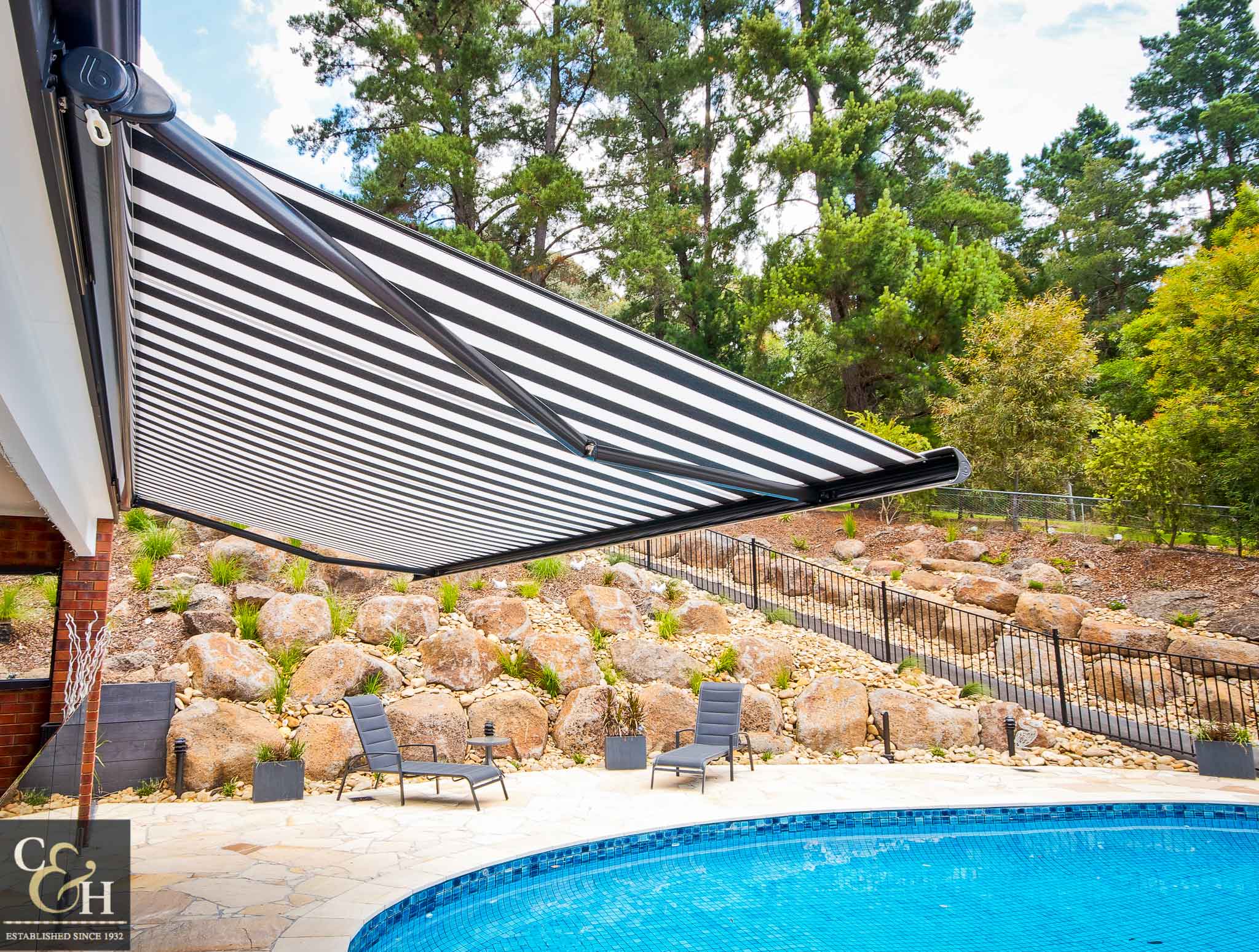 Brustor-B50-Full-Cassette-Folding-Arm-Awnings-3 over a pool