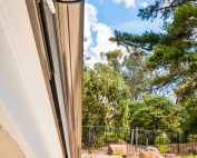 Brustor-B50-Full-Cassette-Folding-Arm-Awnings-4 outside a house
