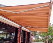 Brustor-B50-Full-Cassette-Folding-Arm-Awnings-6 outside a house