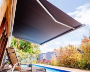 Brustor-B50-Full-Cassette-Folding-Arm-Awnings-7 over a pool