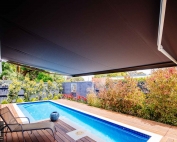 Brustor-B50-Full-Cassette-Folding-Arm-Awnings-9 covering the pool