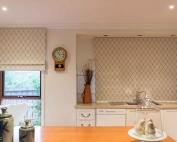 A kitchen with roman blinds 55 on from Campbell & Heeps