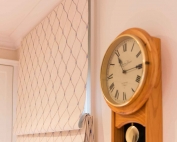 A living room window with roman blinds 59 from Campbell & Heeps