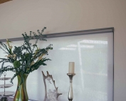 Screen roller blinds 34 inside an apartment