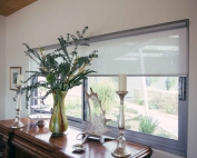 Screen roller blinds 35 inside an apartment