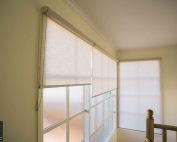 Screen roller blinds 44 inside an apartment